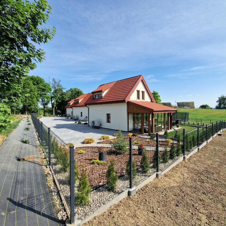 Markowe Domki Ryn  Bagian luar foto